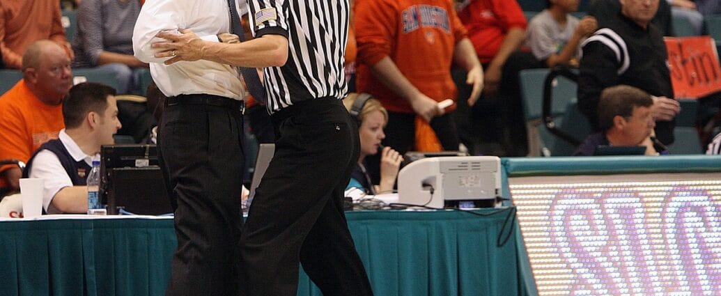 basketball, coach, referee, tussle, confrontation, restraining, sport, game, male, court, activity, athletic, competition, competitive, action, men, stadium, people, uniform, league, crowd, referee, referee, referee, referee, referee