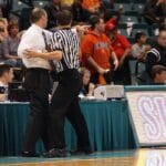 basketball, coach, referee, tussle, confrontation, restraining, sport, game, male, court, activity, athletic, competition, competitive, action, men, stadium, people, uniform, league, crowd, referee, referee, referee, referee, referee