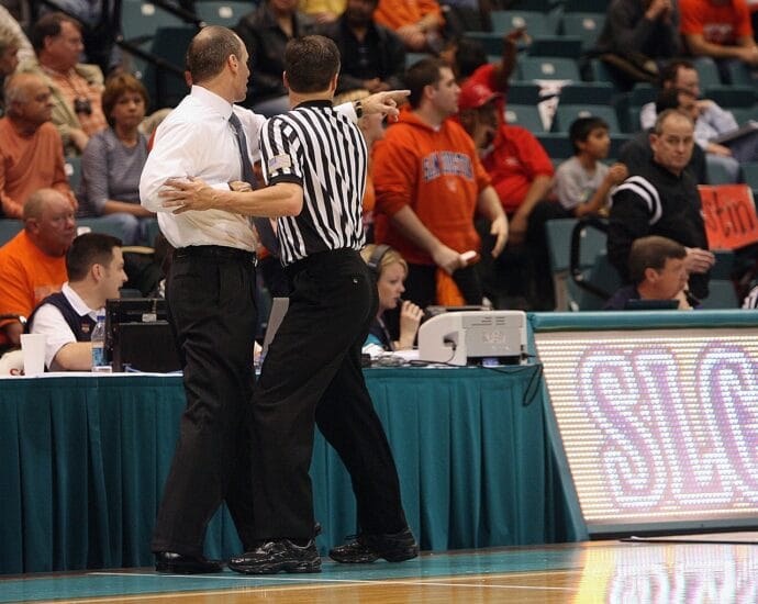 basketball, coach, referee, tussle, confrontation, restraining, sport, game, male, court, activity, athletic, competition, competitive, action, men, stadium, people, uniform, league, crowd, referee, referee, referee, referee, referee
