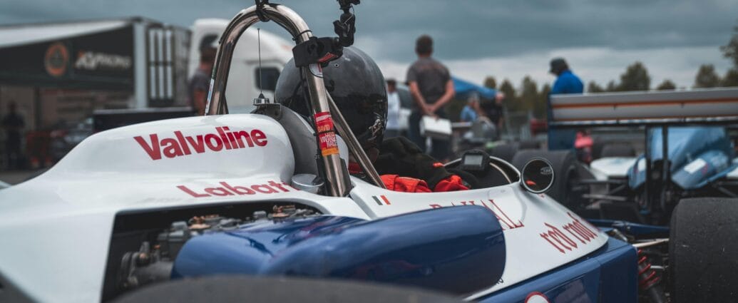Close-up view of a racer in a Formula car at Mont-Tremblant. Motorsport excitement captured.